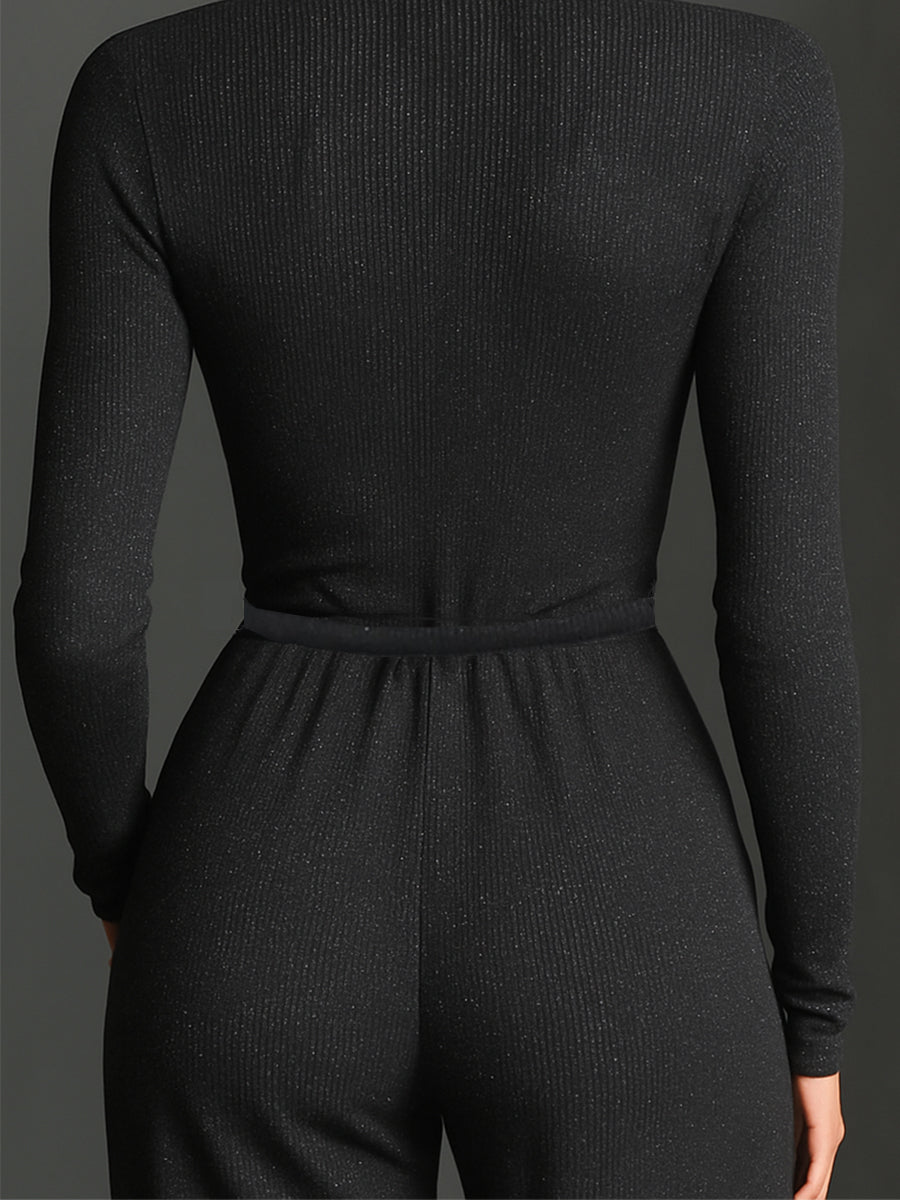 Perla – Mono elegante de punto con brillo y cremallera frontal