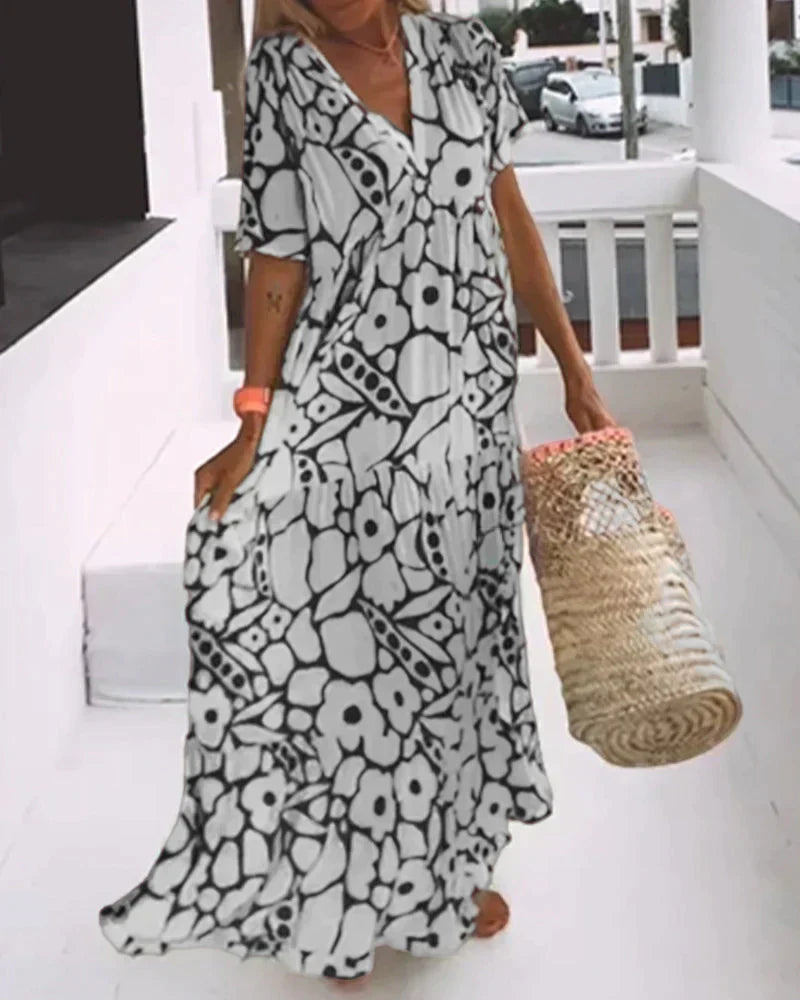 Cristina | Vestido largo de verano con corte fluido y elegante estampado gráfico