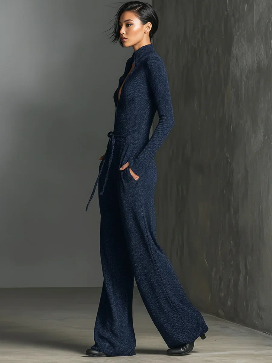 Perla – Mono elegante de punto con brillo y cremallera frontal