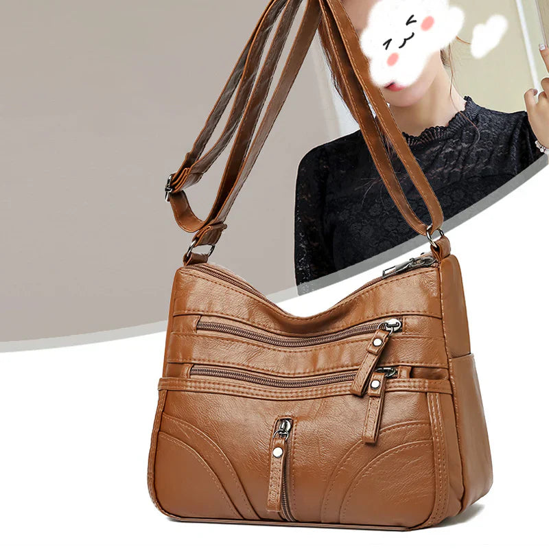 Nerea - Bolso bandolera moderno con múltiples cremalleras y correa ajustable