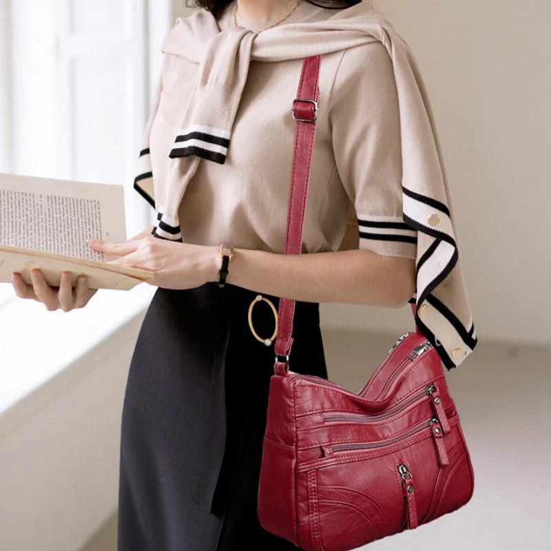 Nerea - Bolso bandolera moderno con múltiples cremalleras y correa ajustable