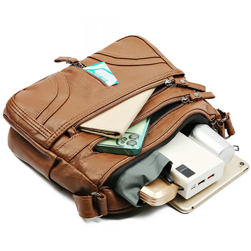 Nerea - Bolso bandolera moderno con múltiples cremalleras y correa ajustable