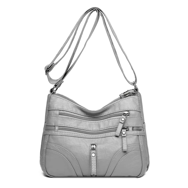 Nerea - Bolso bandolera moderno con múltiples cremalleras y correa ajustable
