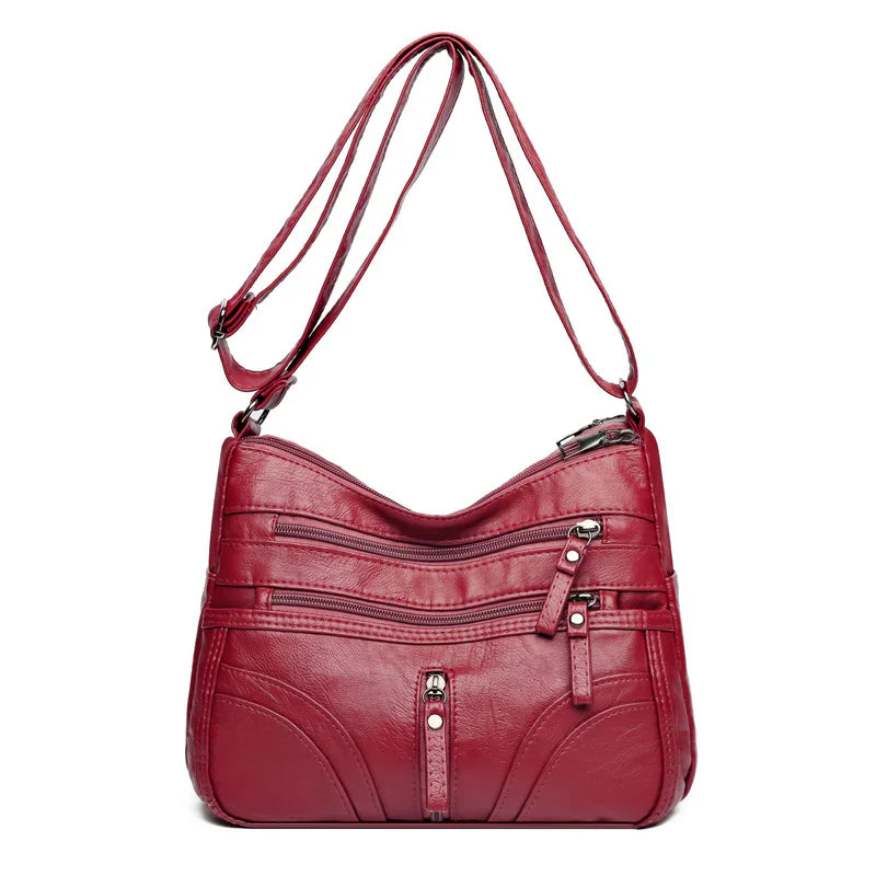 Nerea - Bolso bandolera moderno con múltiples cremalleras y correa ajustable