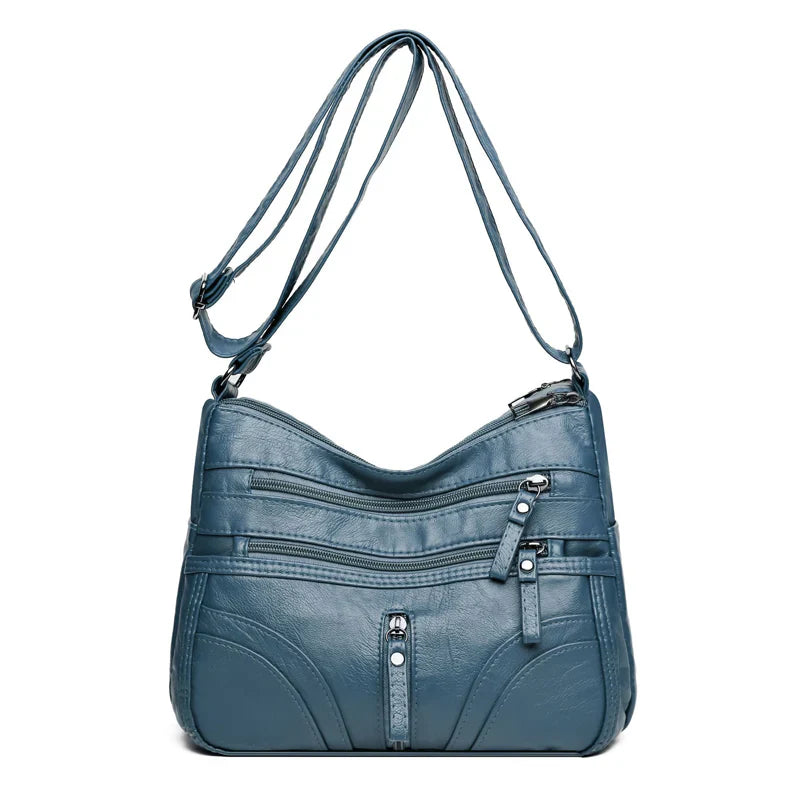 Nerea - Bolso bandolera moderno con múltiples cremalleras y correa ajustable