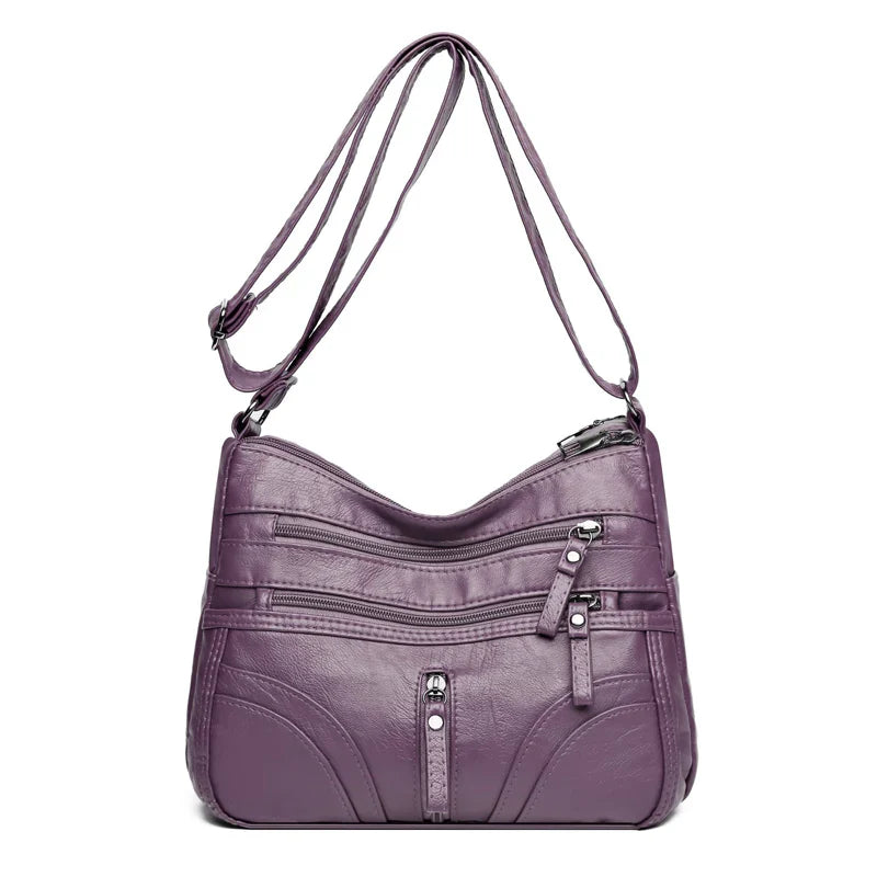 Nerea - Bolso bandolera moderno con múltiples cremalleras y correa ajustable
